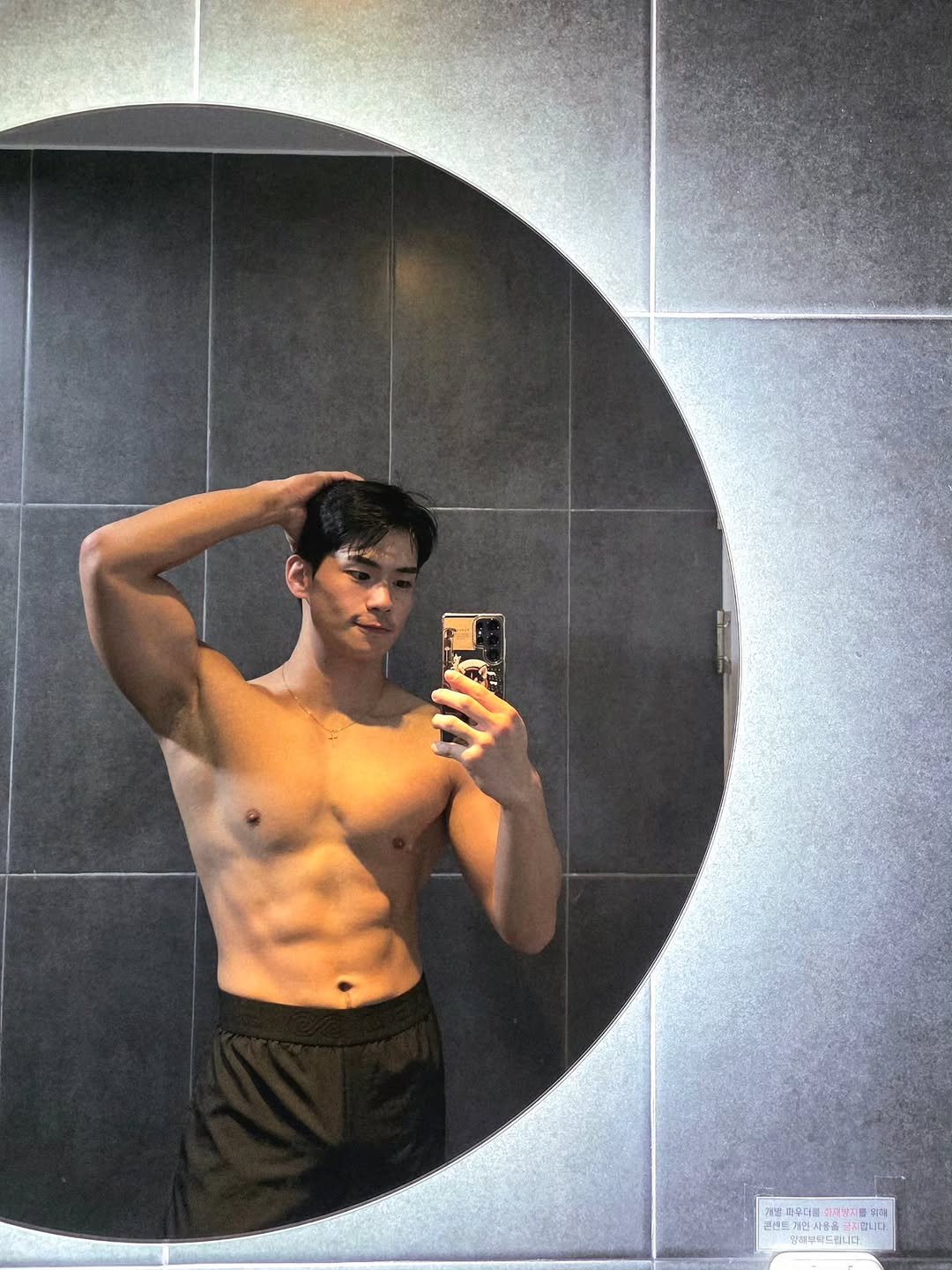 Photo by 김병수 Kim Byeong Su on October 16, 2025. May be a selfie of one or more people, biceps, mirror and text.