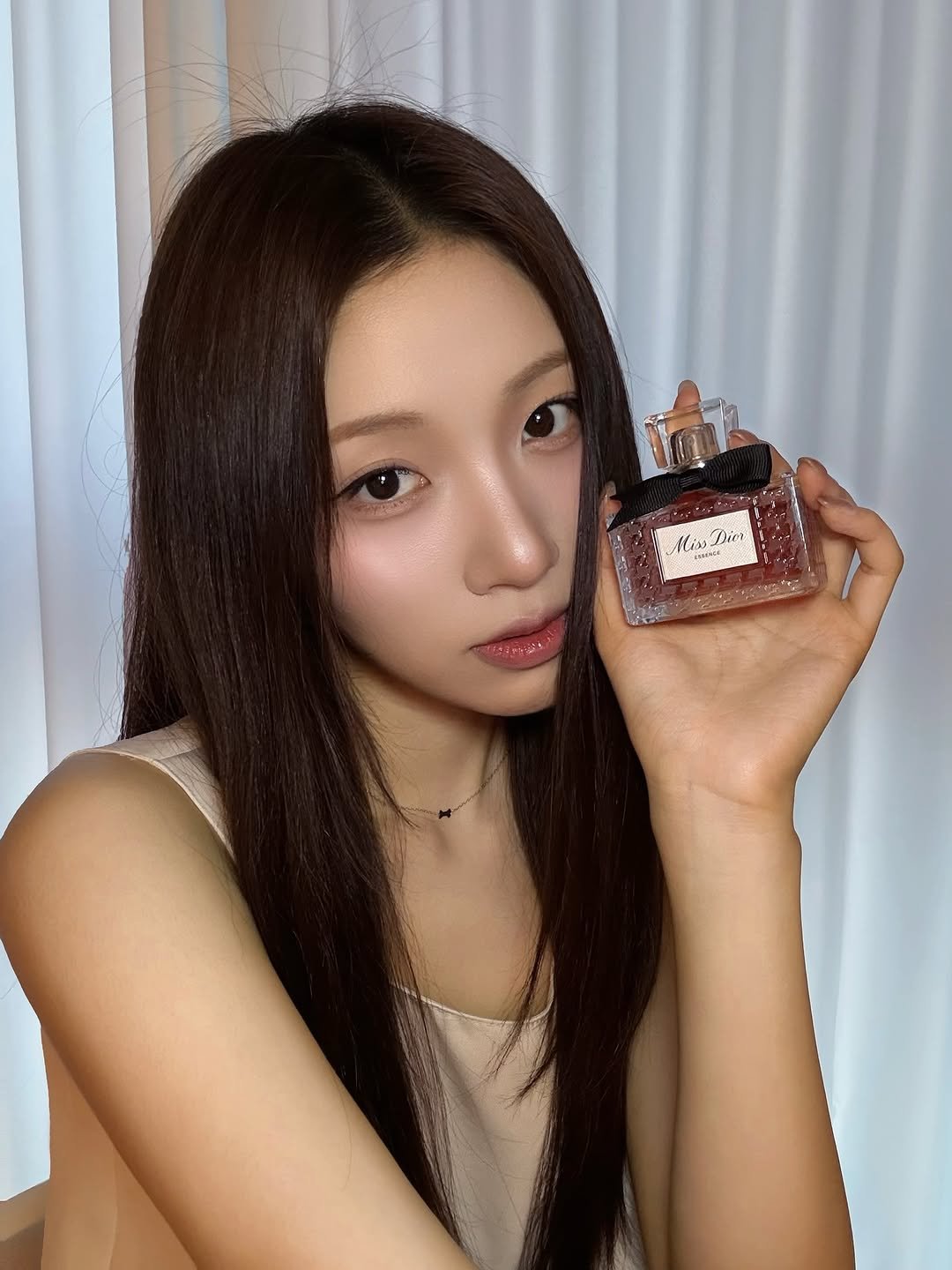 Photo by 석다예 on March 12, 2026. May be an image of one or more people, makeup, lipstick, fragrance, perfume and text.