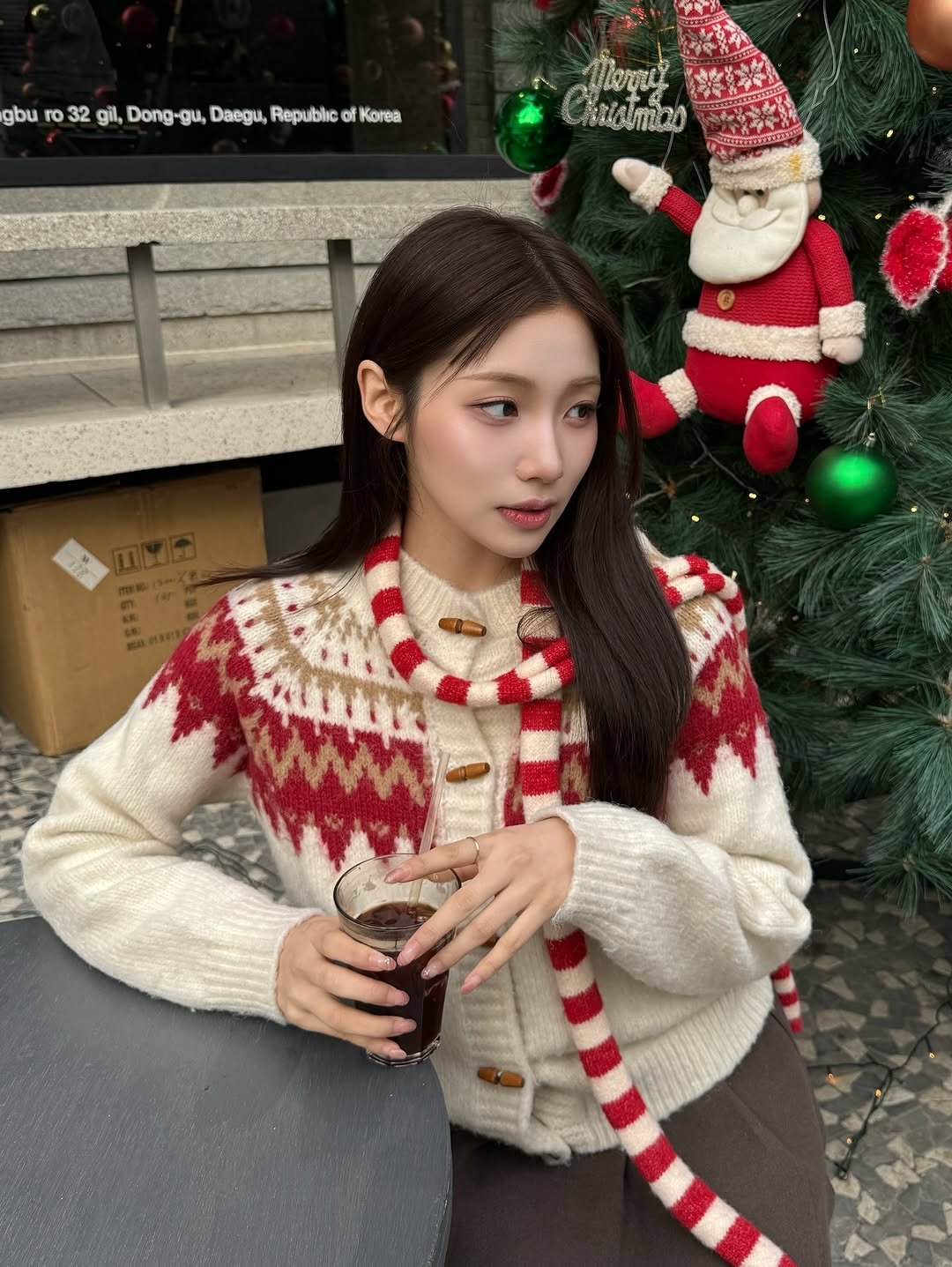 Photo by 석다예 on December 25, 2025. May be an image of one or more people, hair, turtleneck and sweater.