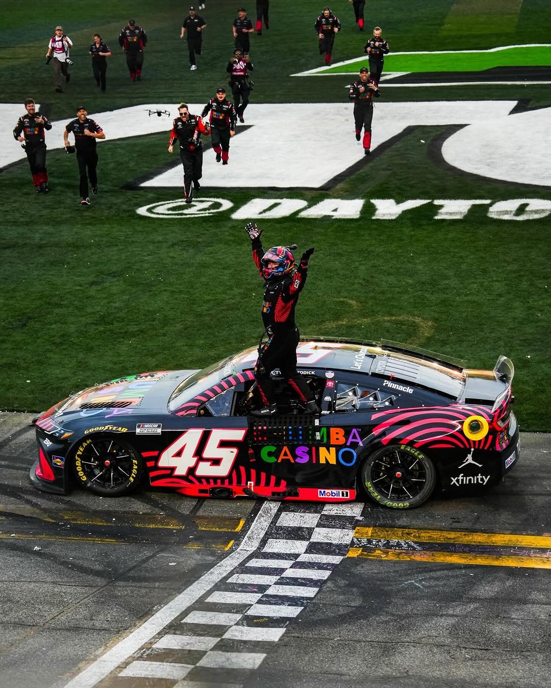 Photo shared by Daytona International Speedway on March 23, 2026 tagging @nascar, @tyler_reddick, and @23xiracing. May be an image of racing vehicles, race car and text.