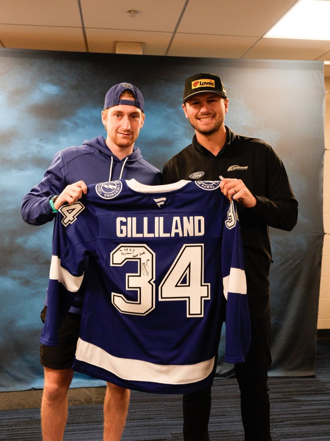 Photo shared by Daytona International Speedway on January 06, 2026 tagging @tblightning, @teamfrm, and @toddgilliland_. May be an image of hockey, hockey stick and text.