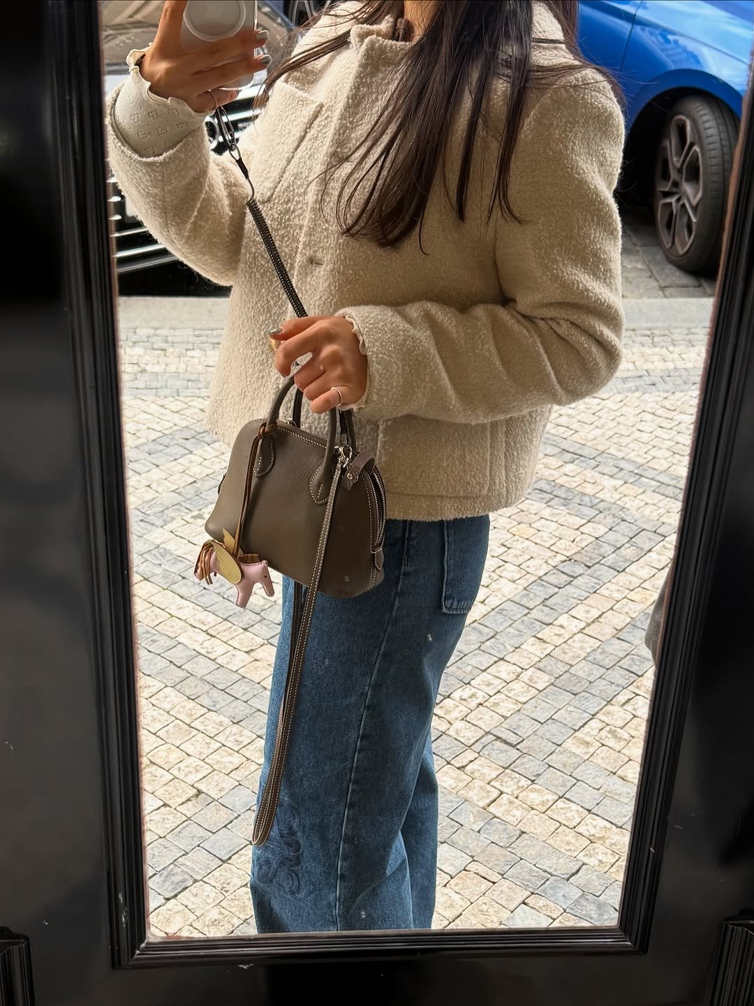 Photo by 드엘리사 | yoonjung Lee on October 02, 2025. May be a selfie of 1 person, mirror, cardigan, turtleneck and text.