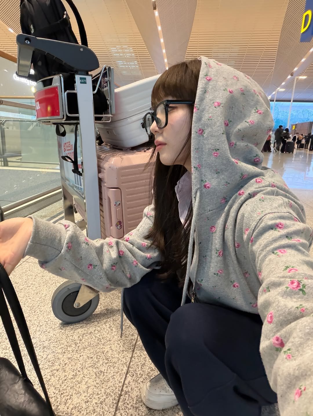 Photo by 정연 on February 12, 2026. May be an image of suitcase, parka, luggage and text.