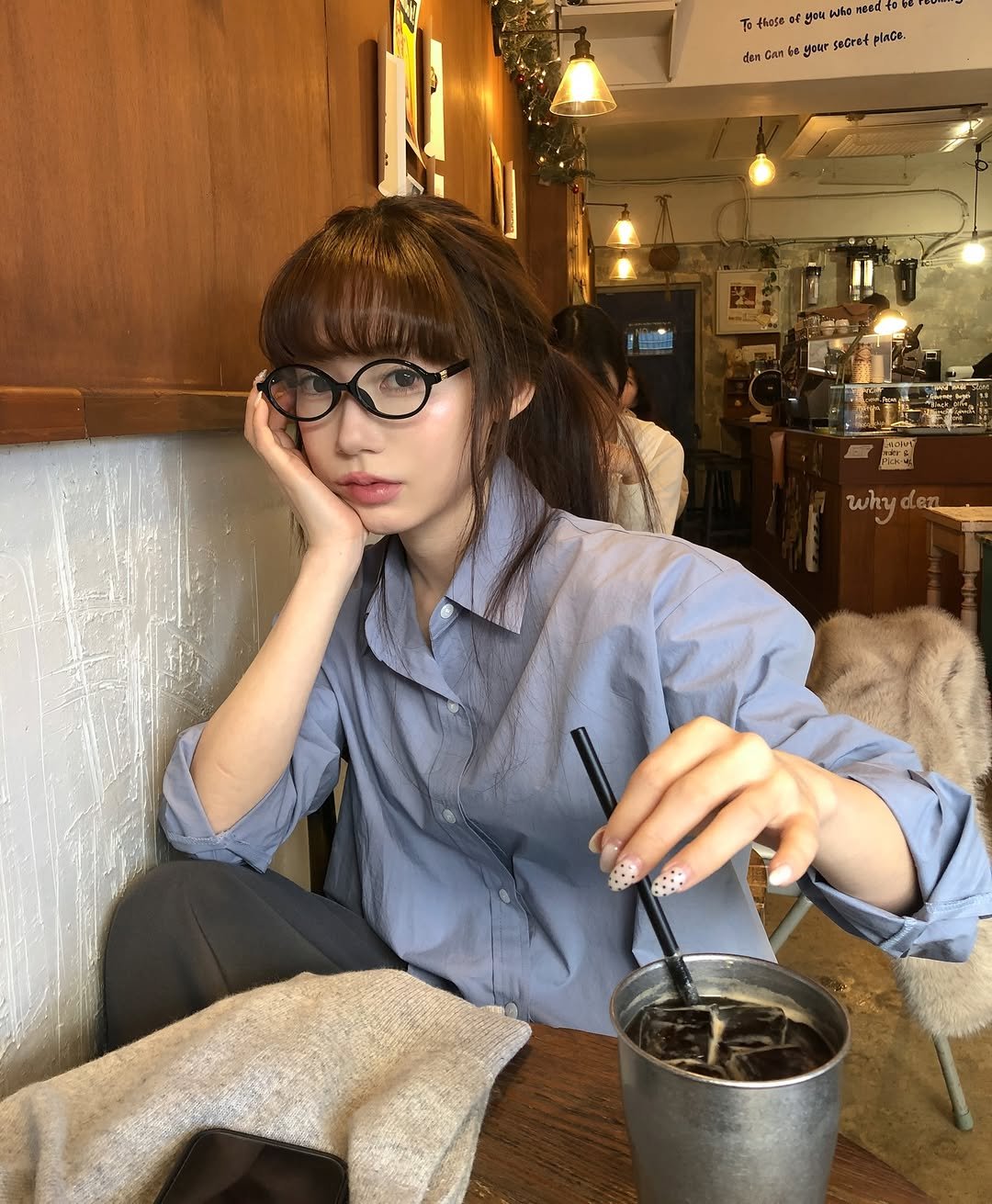 Photo shared by 정연 on February 09, 2026 tagging @dearbyme_official. May be an image of one or more people, hair, drink, eyeglasses, cornflower and text.