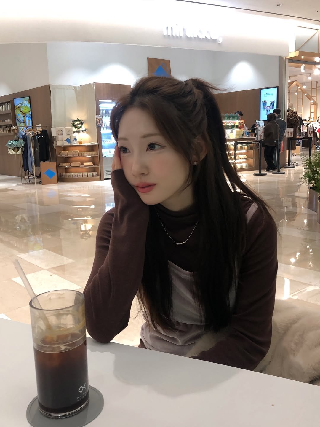 Photo by 정연 on December 24, 2025. May be an image of one or more people, hair, drink, cornflower and text.