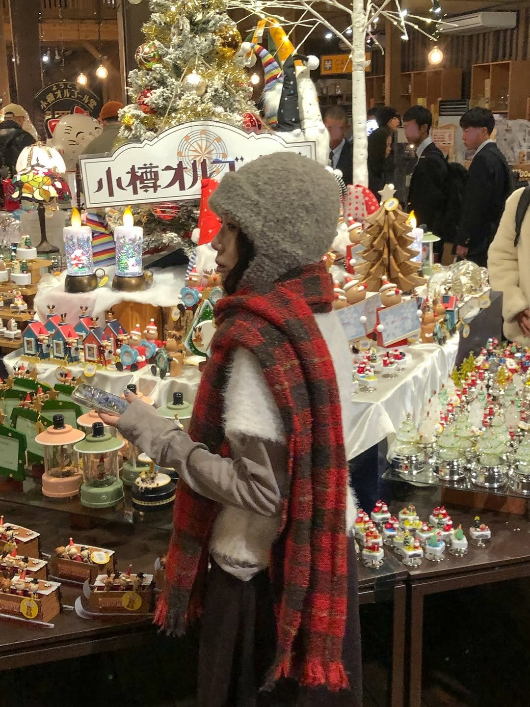 Photo by 정연 on December 21, 2025. May be an image of one or more people, duffle coat, scarf and text.