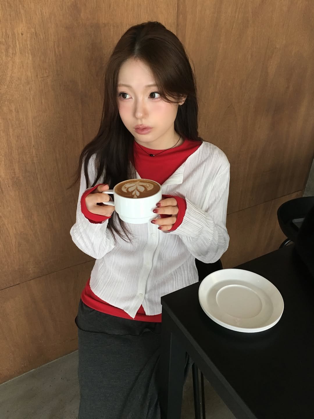 Photo by 정연 on December 18, 2025. May be an image of one or more people, hair, outerwear, top and text.