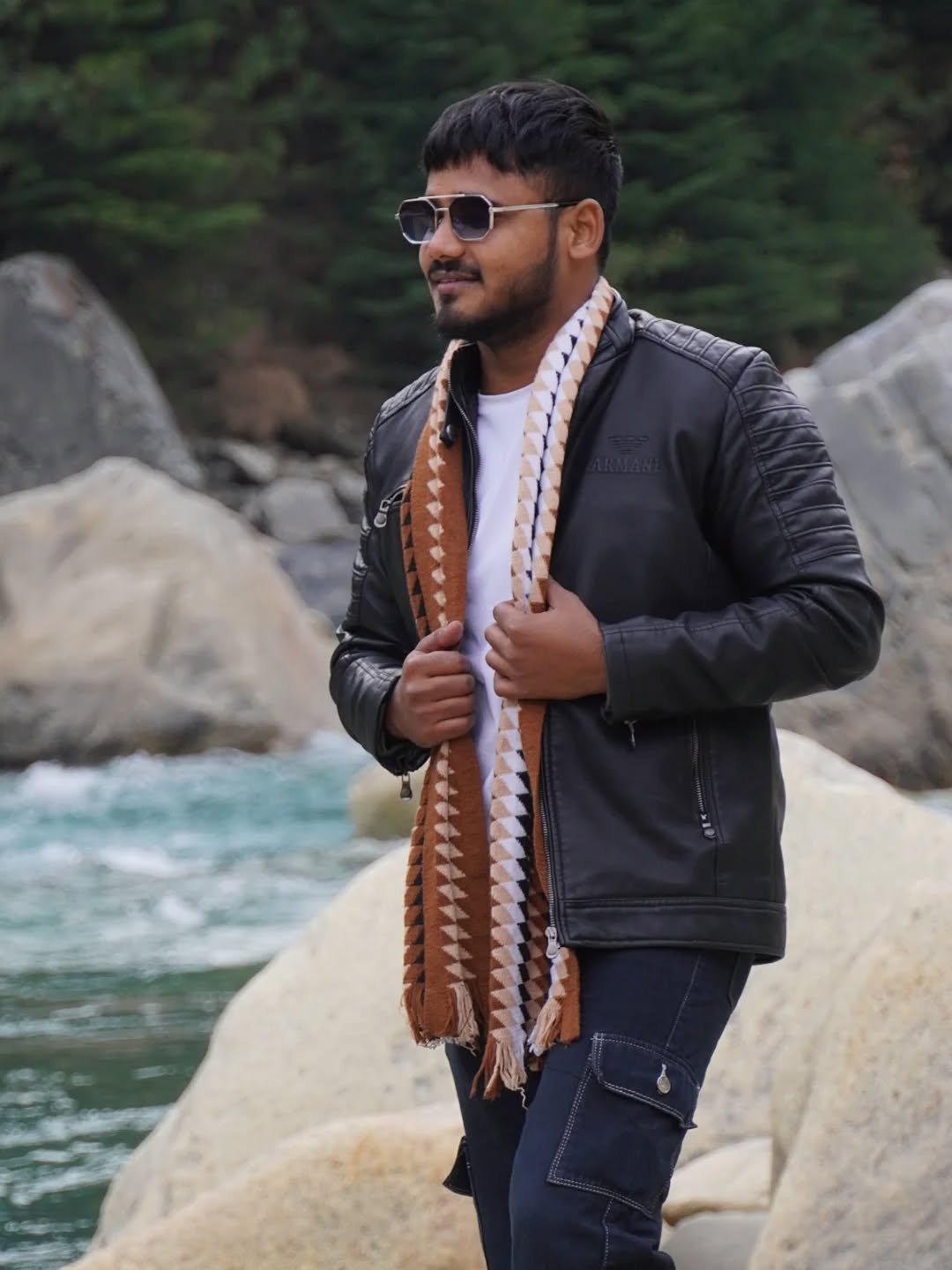 Photo by Taufik Ansari on December 20, 2025. May be an image of scarf, jacket, shawl, sunglasses, outdoors and text.