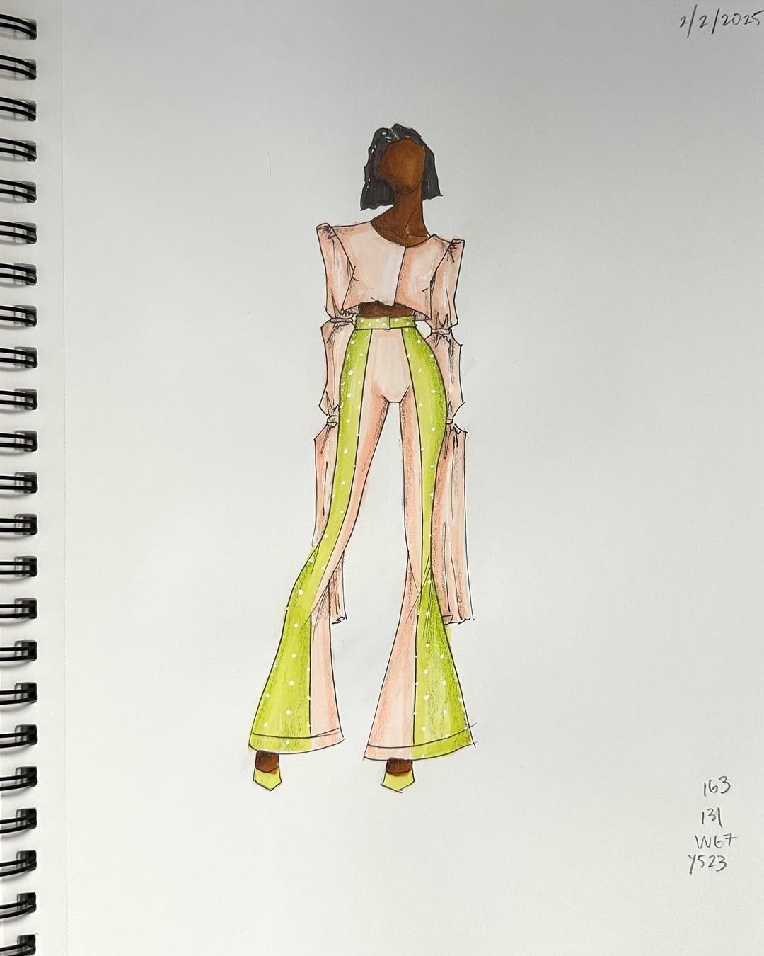 A fashion sketch of a person wearing a pink and green two piece ensemble.