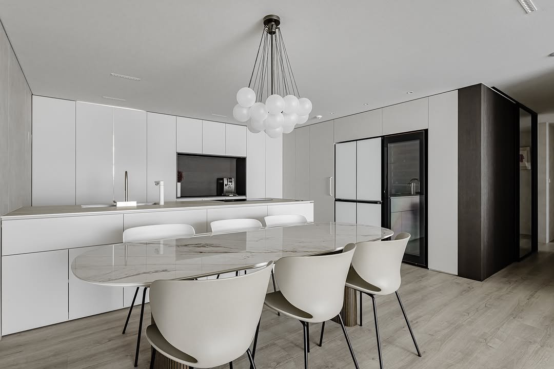 Photo by (주)디자인진작  DESIGN JINJAK on September 22, 2025. May be an image of lighting, dining table, kitchen table, indoors, kitchen and text.