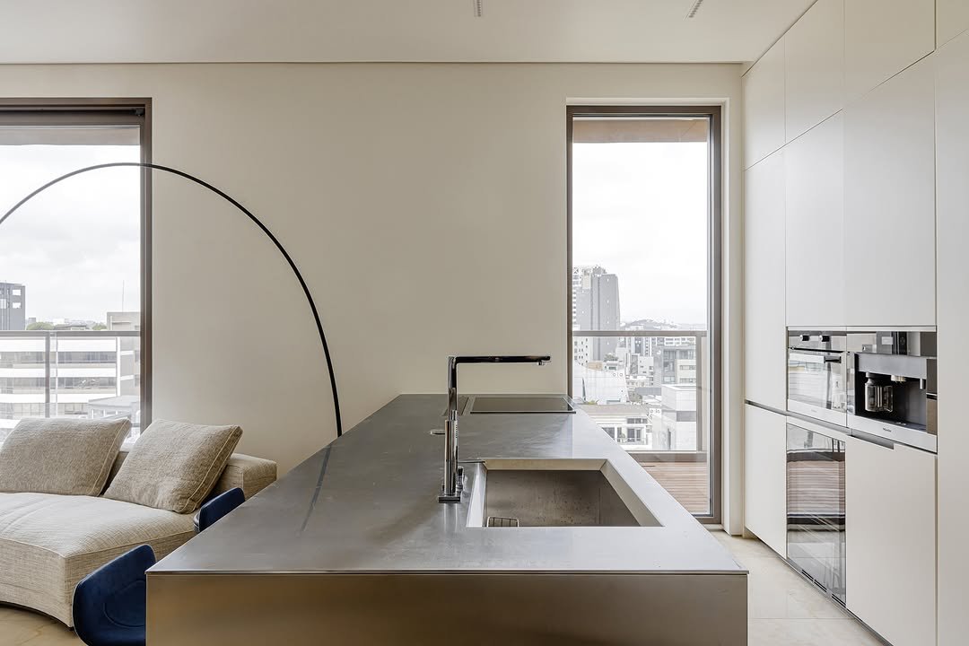Photo shared by (주)디자인진작  DESIGN JINJAK on September 09, 2025 tagging @molteniandc. May be an image of lighting, countertop, indoors, kitchen and text.