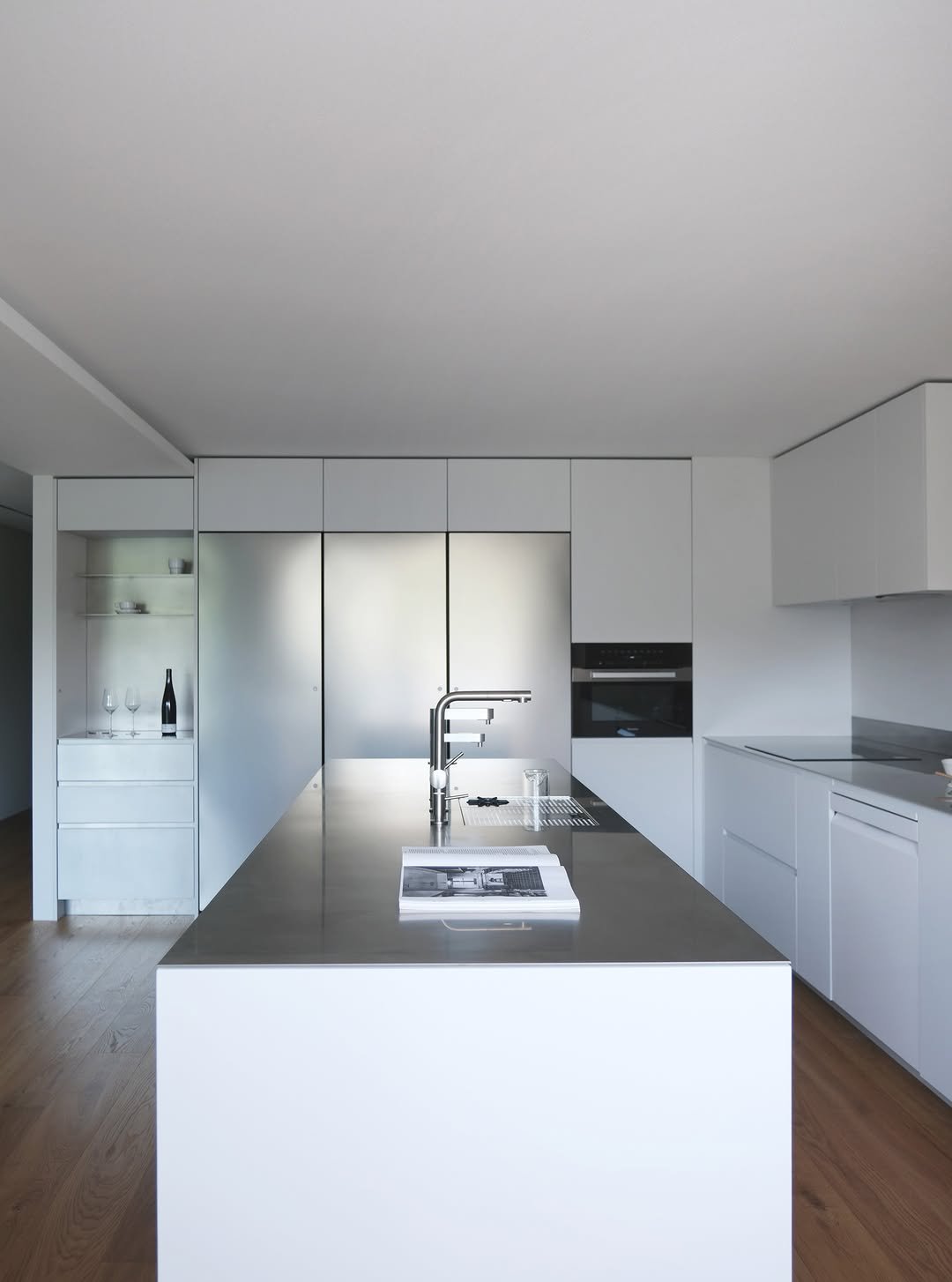 Photo by (주)디자인진작  DESIGN JINJAK on September 20, 2025. May be an image of kitchen island, countertop, kitchen appliance, indoors, kitchen and text.