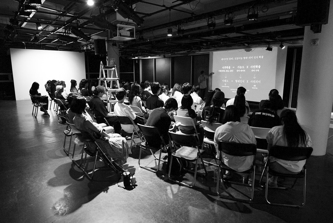 Photo by 디학 on July 28, 2025. May be a black-and-white image of 8 people, crowd and text.
