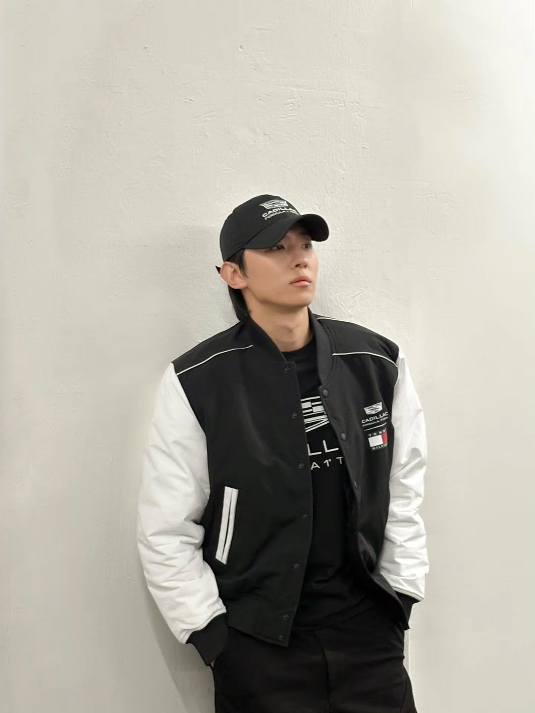 Photo shared by DEX / 김진영 on February 10, 2026 tagging @tommyhilfiger. May be an image of one or more people, hat, bolo tie, parka, top, flight jacket and text.