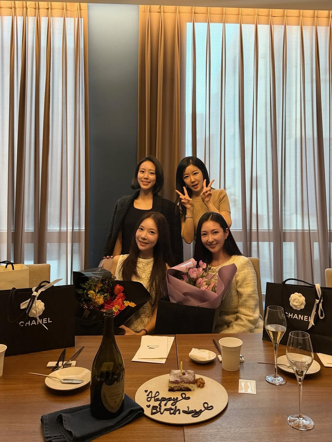 Photo shared by 다이애나 on January 13, 2026 tagging @sochanelso, @bk_kimm, and @ballet_jy. May be an image of one or more people, table, flower and text.