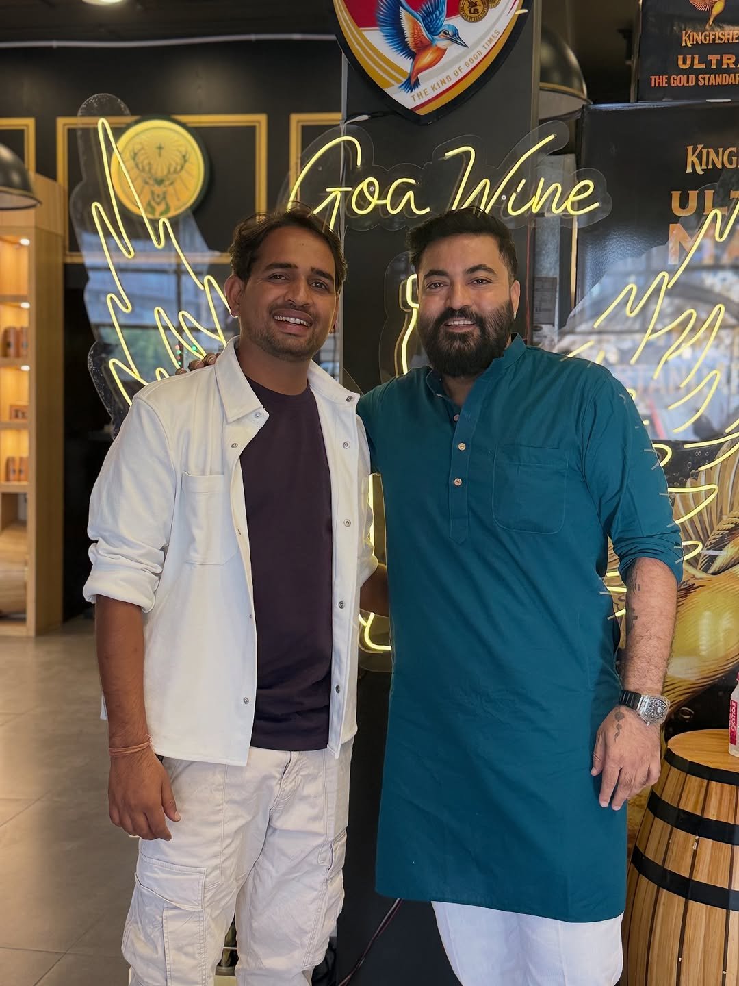 Photo shared by Jitendra Rangwani on October 19, 2025 tagging @dilraj_singh_rawat. May be an image of one or more people, beard and text that says 'Aa IMES 0000 KINGFISHE ULTR THEGOLDSTANDAR OLDSTAMDA KING oa Wine ΑΝ'.