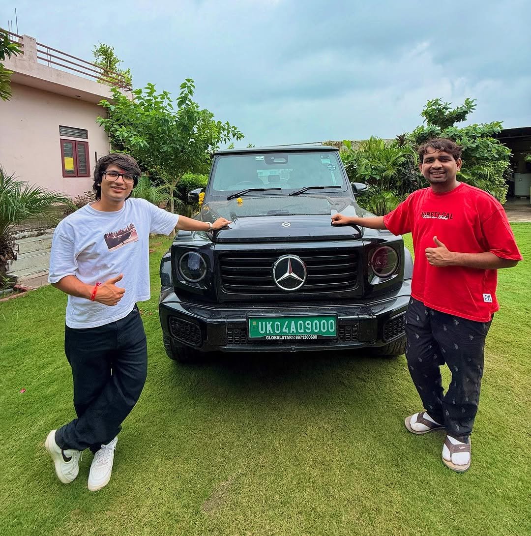 Photo shared by Sourav Joshi on July 30, 2025 tagging @dilraj_singh_rawat. May be an image of 2 people, car, jeep, minivan, limousine, windshield and text.