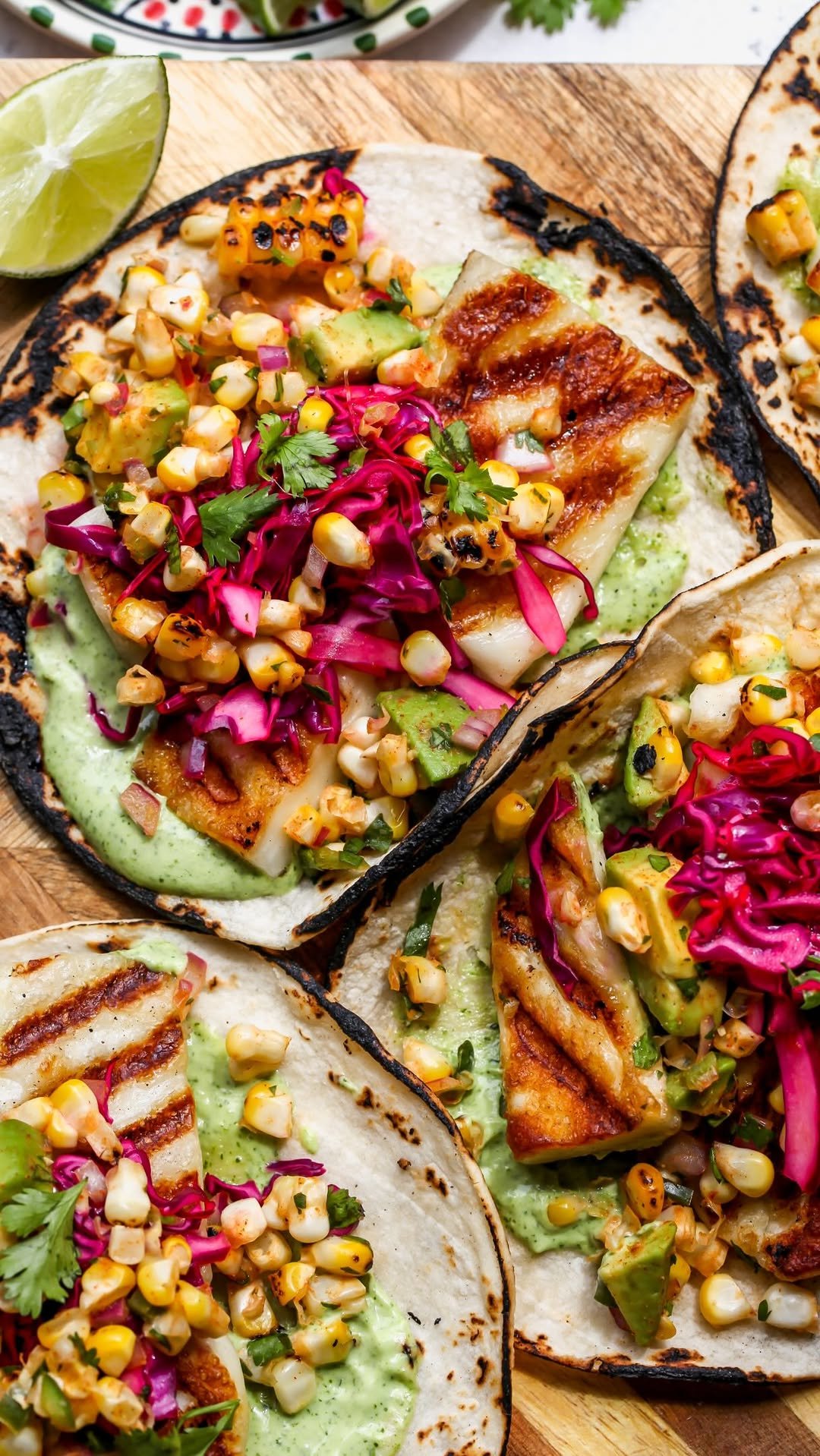 dishingouthealth 게시물 이미지: Grilled Halloumi Tacos with Zesty Corn Salad...