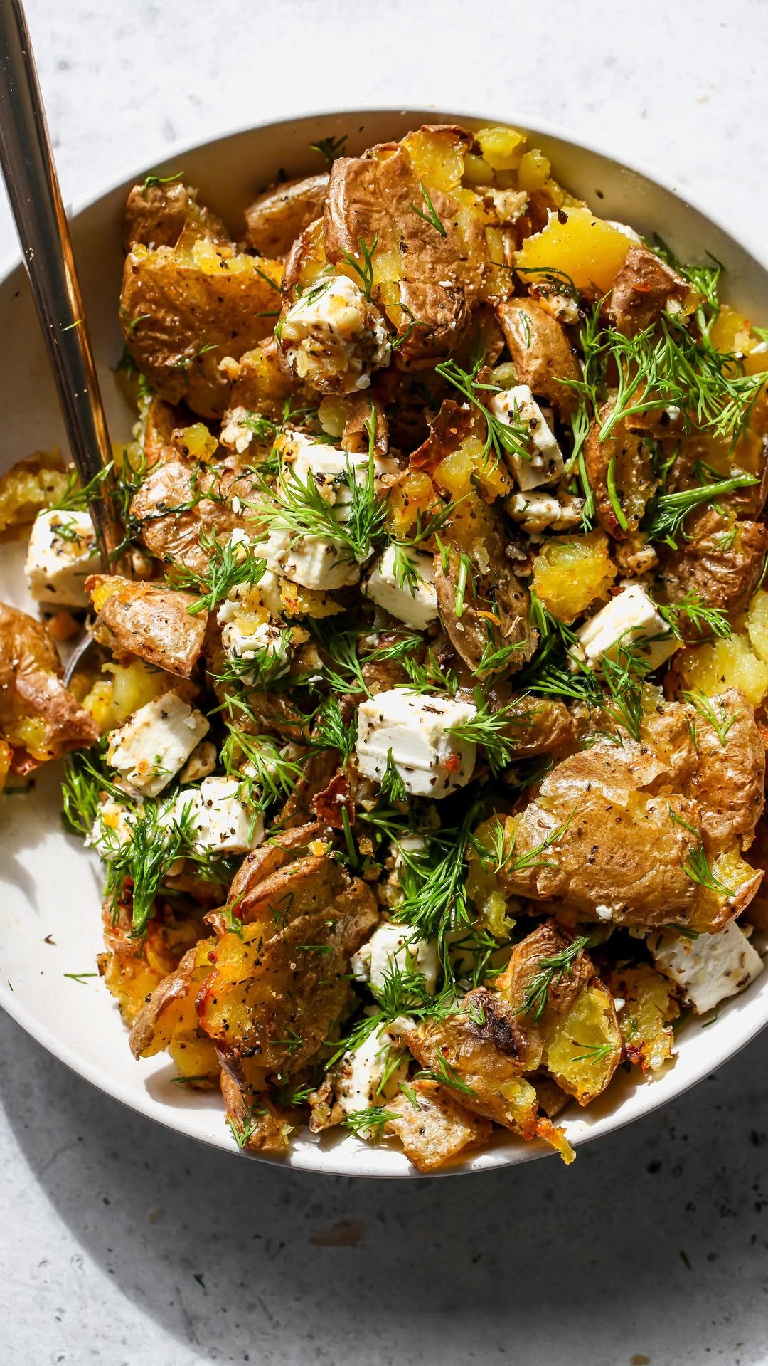 dishingouthealth 게시물 이미지: Crispy Lemon-Feta Roasted Potatoes = peak...