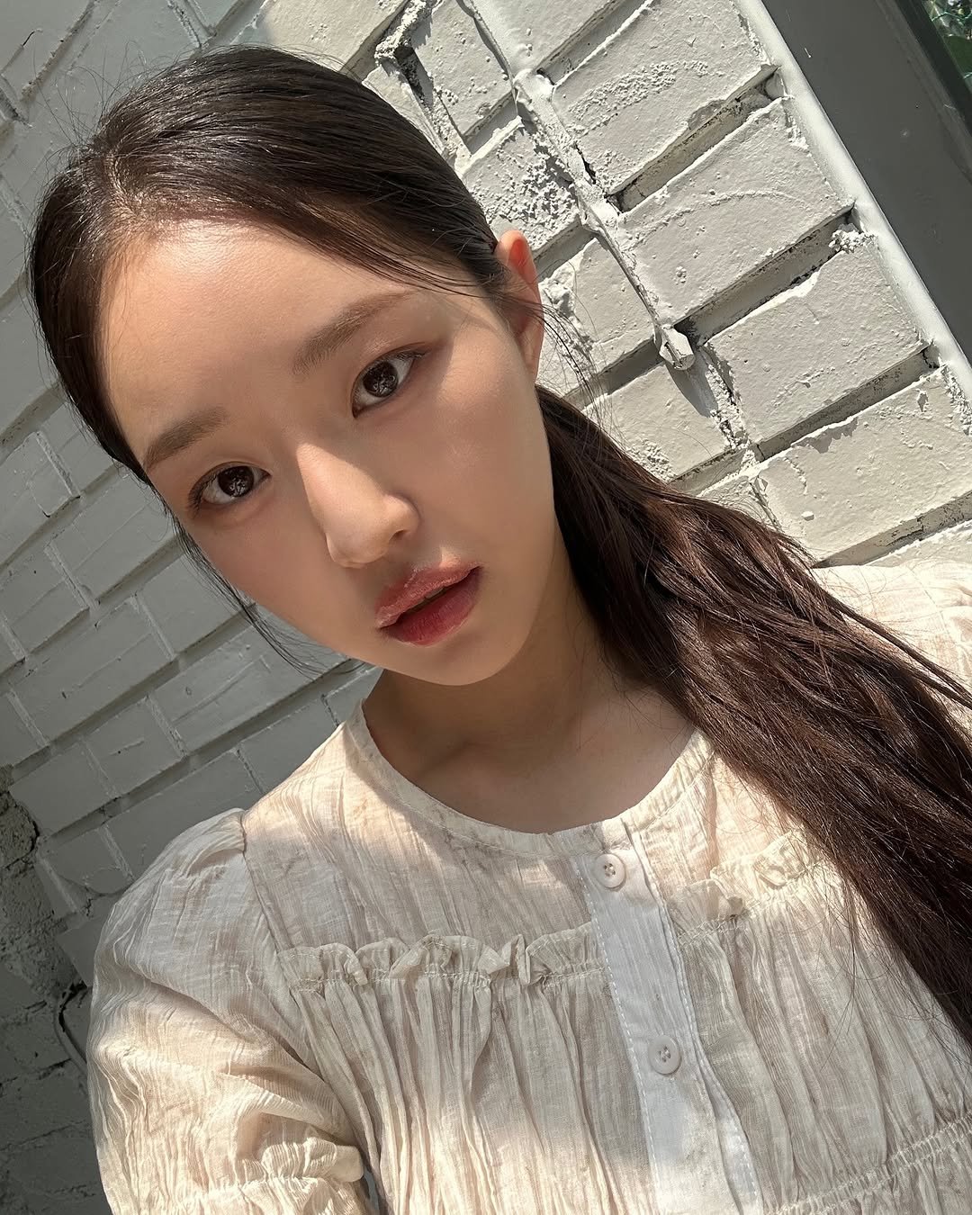 Photo by 홍 은 Hong eun on August 06, 2025. May be an image of 1 person, braids and text.