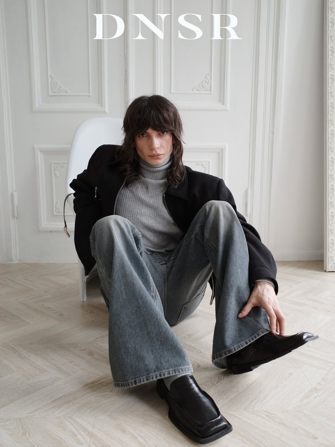 Photo by DNSR 디앤에스알 on December 21, 2025. May be an image of boots, turtleneck, magazine, wool and text that says 'DNSR'.