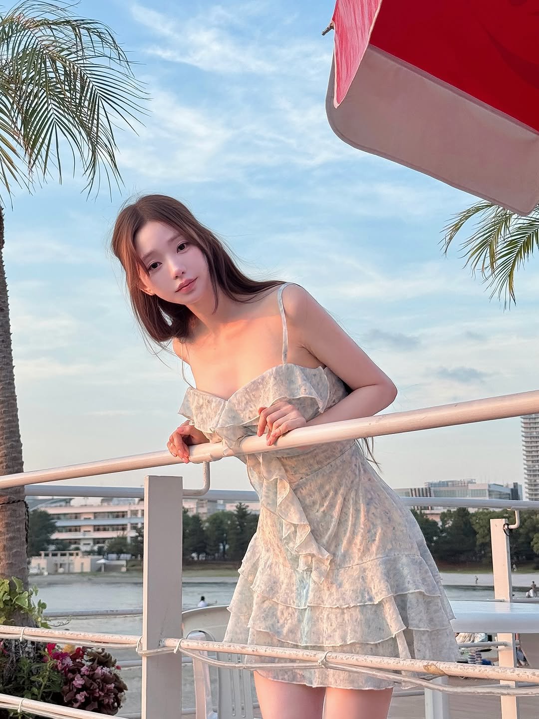 Photo by 김도연 on August 09, 2025. May be an image of 1 person, hair, dress, outdoors and text.