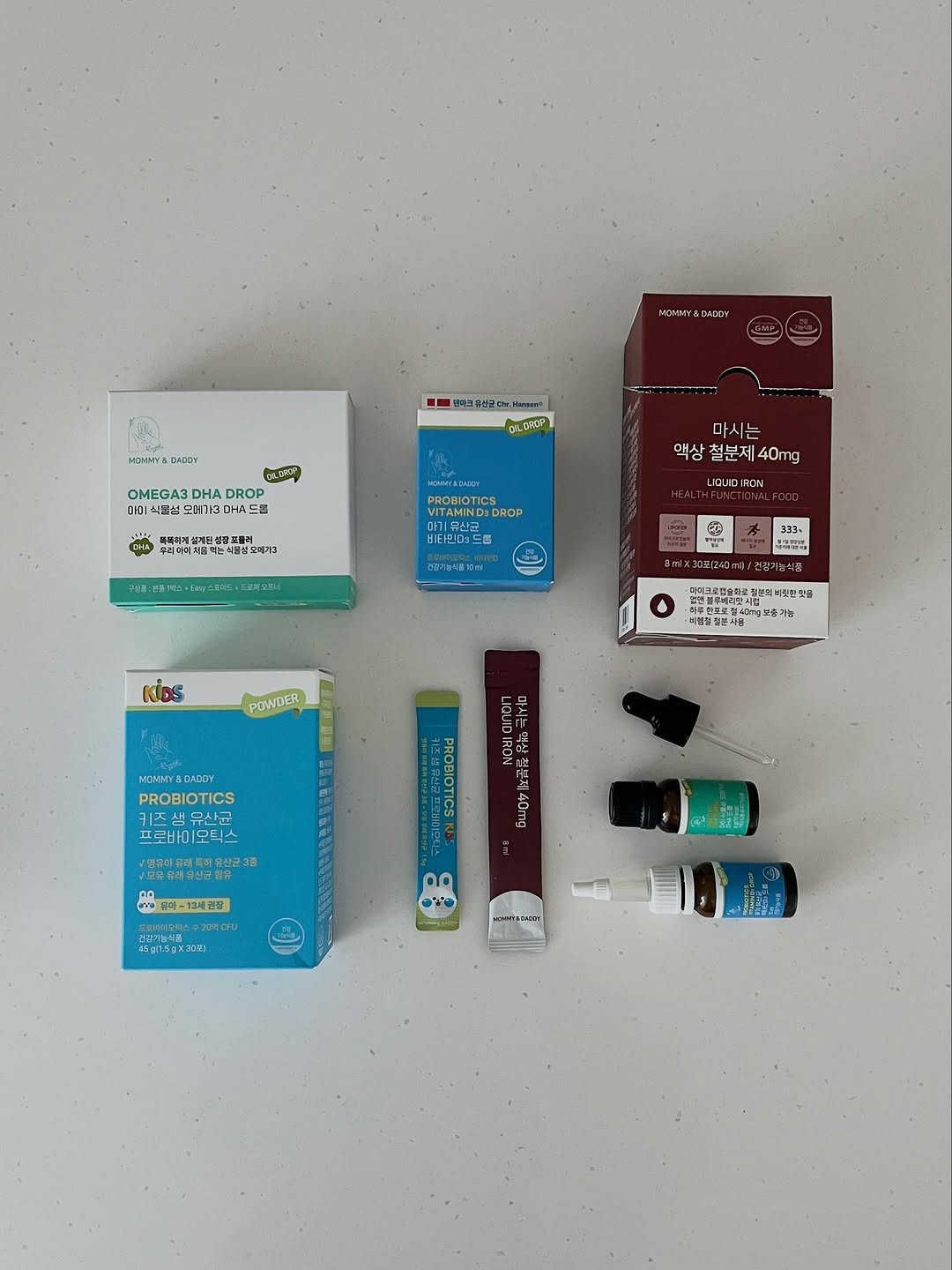 Photo shared by 도둥이네 on September 25, 2025 tagging @mommydaddy_official. May be an image of medicine, fragrance, battery, hand cream, eraser, dental floss and text.