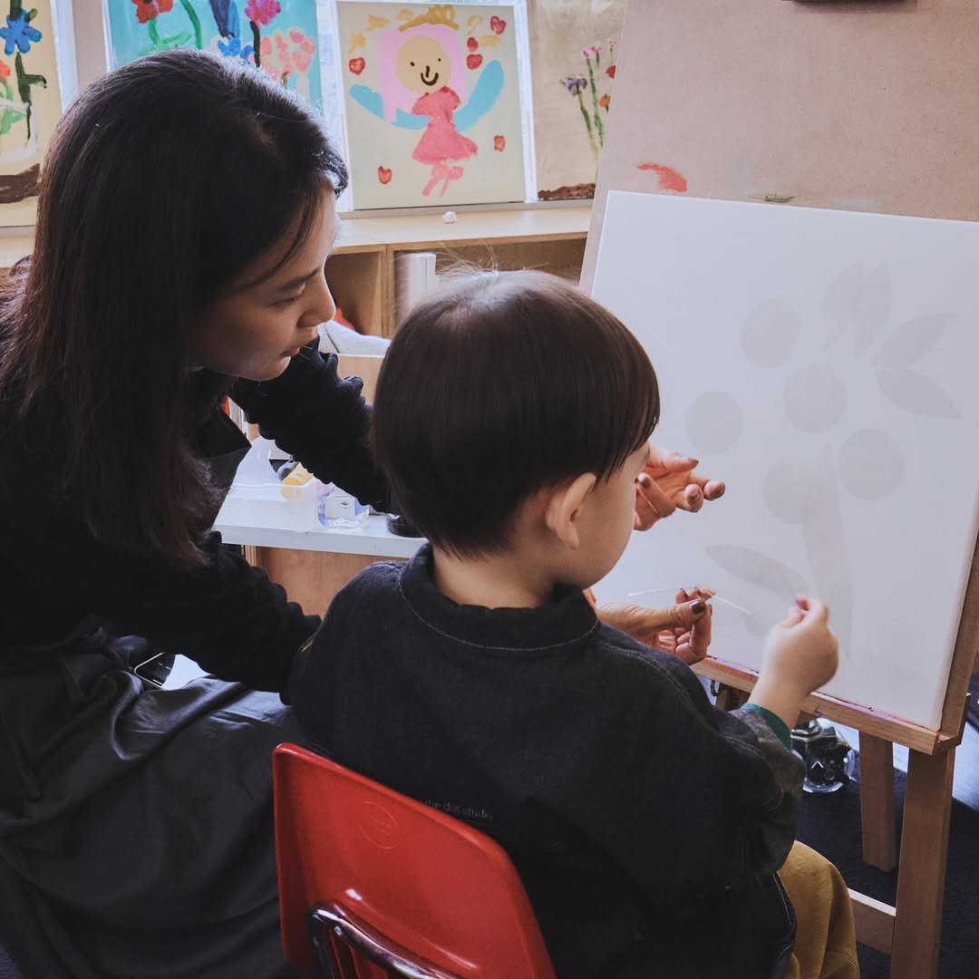 Photo shared by 윤승아 on December 17, 2025 tagging @thedotstudio. May be an image of child, studying and text.
