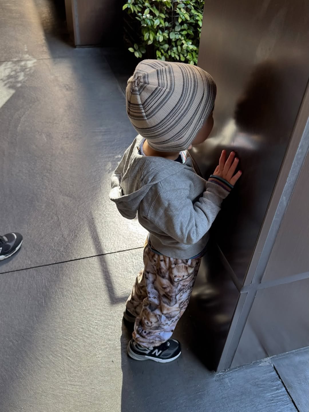 Photo by 윤승아 on November 27, 2025. May be an image of baby, standing, sweatsuit and text.