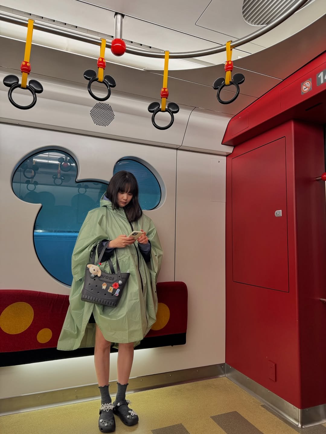 Photo by 윤승아 on April 25, 2026. May be an image of duffle coat, Minnie Mouse and text.