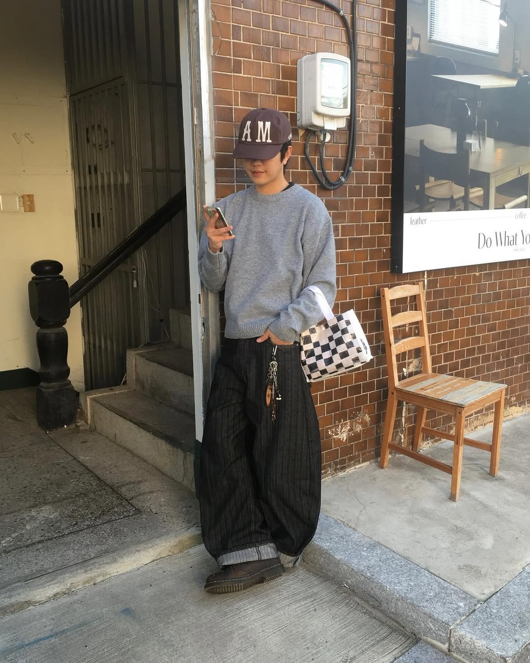 Photo shared by 투븐 / TOVN on December 23, 2025 tagging @tovn_official. May be an image of sweatpants and text.