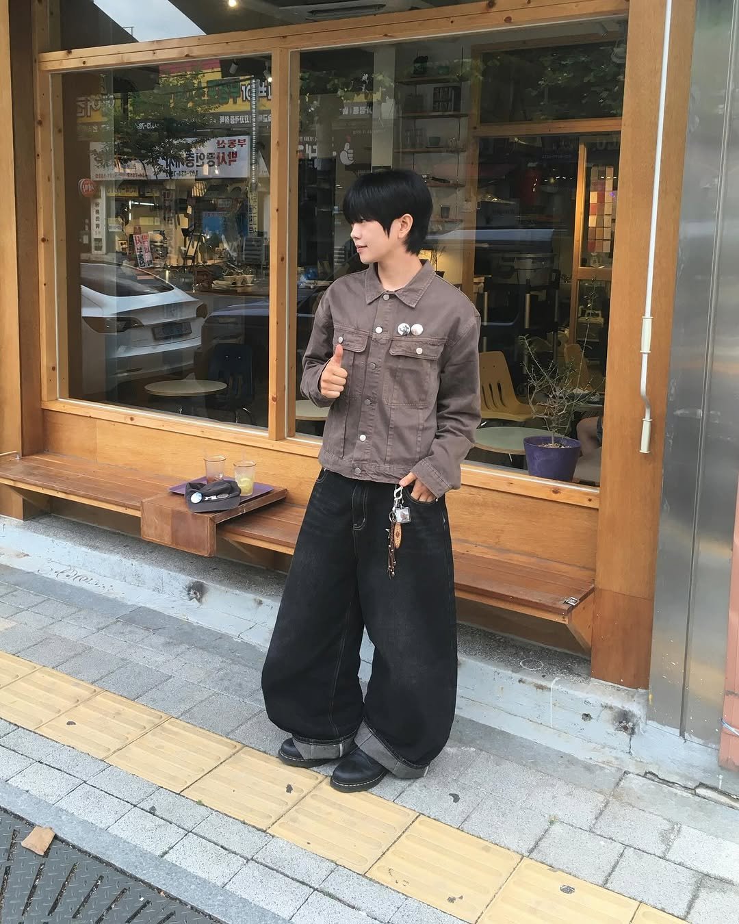 Photo shared by 동현 / 투븐 TOVN on September 14, 2025 tagging @tovn_official. May be an image of 1 person, duffle coat, parka and text.