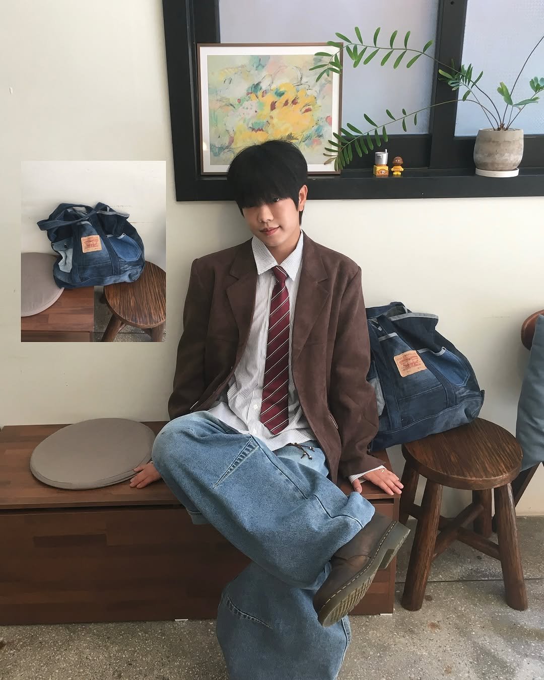 Photo shared by 투븐 / TOVN on November 06, 2025 tagging @tovn_official. May be an image of duffle coat, overcoat, wingtip shoes, blazer, suit, bolo tie and text.