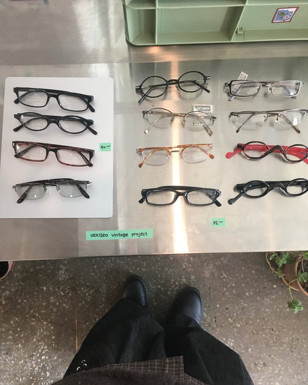 Photo by 투븐 / TOVN on December 14, 2025. May be an image of eyeglasses and text.