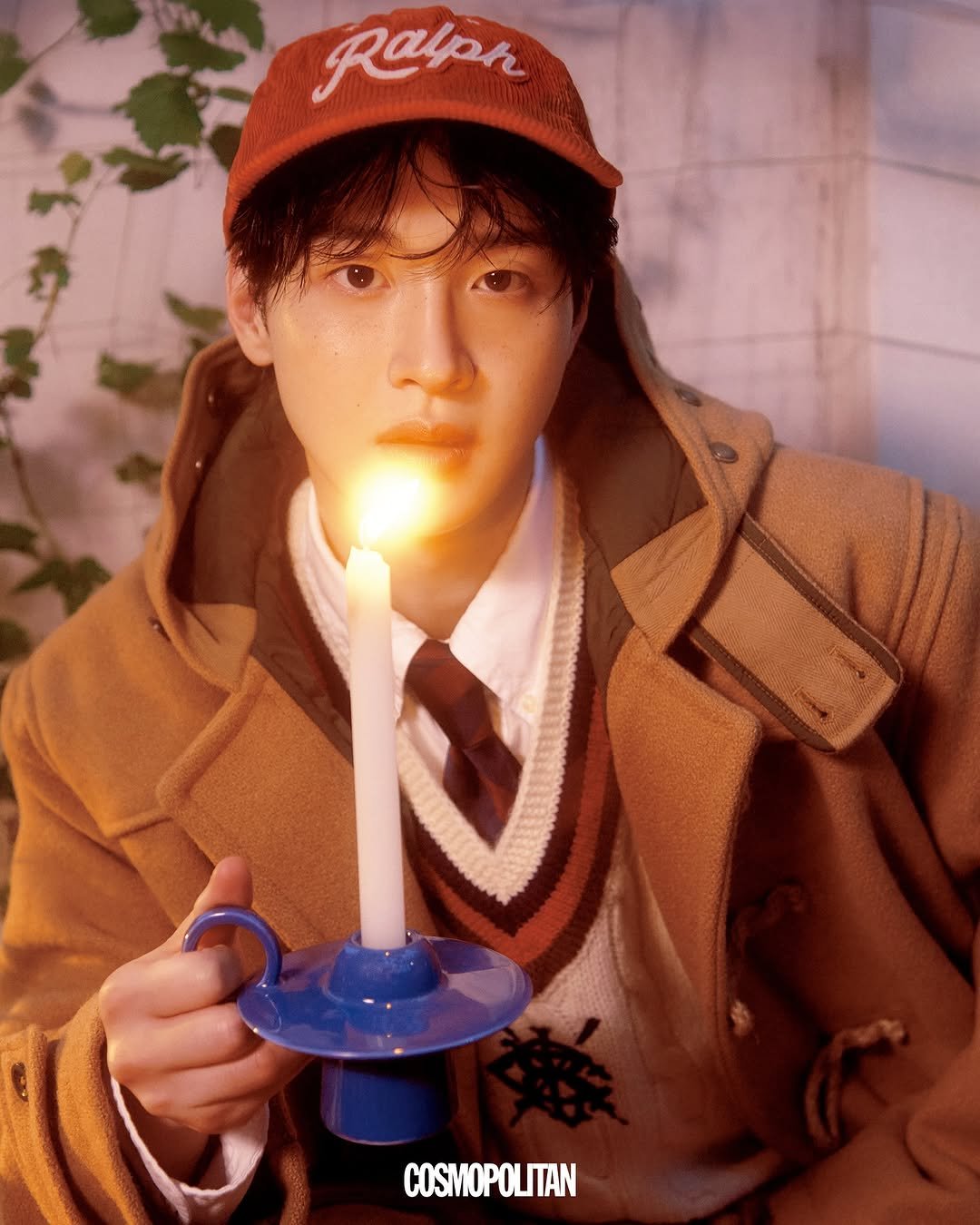 Photo shared by 장동윤 Jang dong Yoon on September 22, 2025 tagging @cosmopolitankorea, and @poloralphlauren. May be an image of 1 person, duffle coat, poster, bolo tie and text that says 'Ralph'.