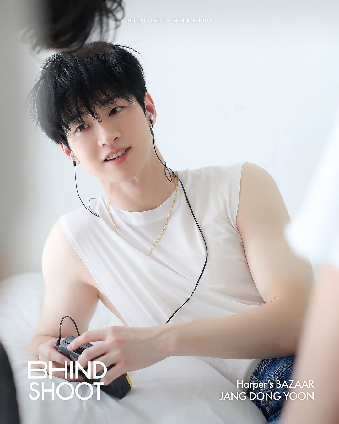 Photo shared by BH Entertainment on September 06, 2025 tagging @dongyoon_0712. May be an image of 1 person, hair, magazine, poster and text that says 'BHENT.OFFICIALBEHNDPHOTO FFICIAL BEHIND PHOTO BH BHIND SHOOT Harper' Harper'sBAZAAR S BAZAAR JANG DONG JANGDONGYOON YOON'.