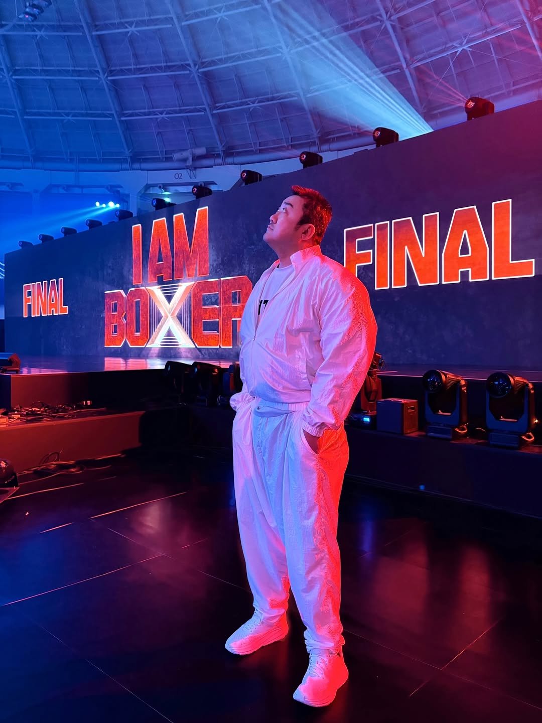 Photo shared by Don Lee 마동석 on January 22, 2026 tagging @bigpunch_boxing. May be an image of sweatsuit, concert and text that says 'IAM FINAL BOXEP FINAL'.
