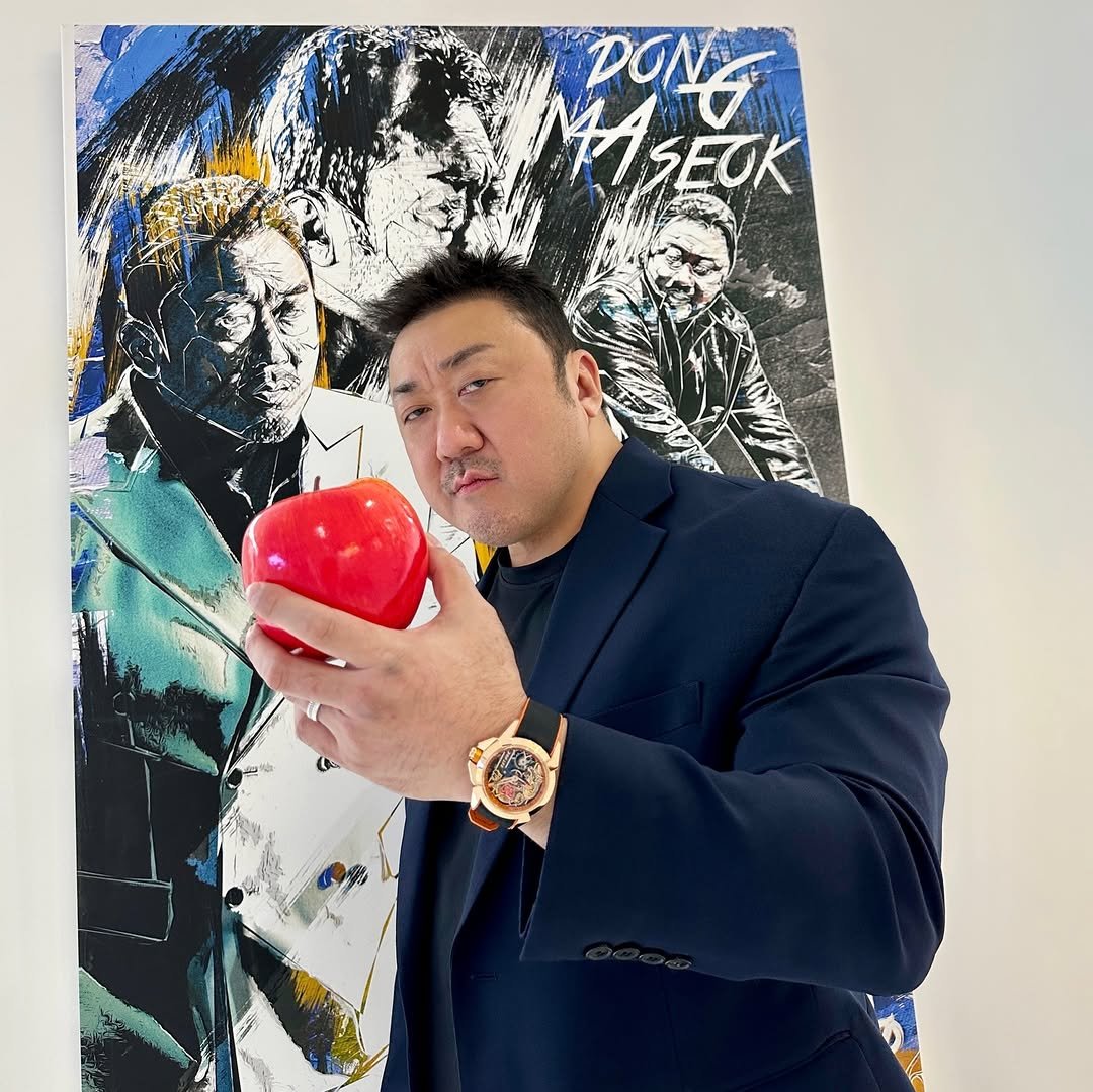 Photo by Don Lee 마동석 on March 27, 2026. May be pop art of wrist watch, apple, paper weight, ball and text.