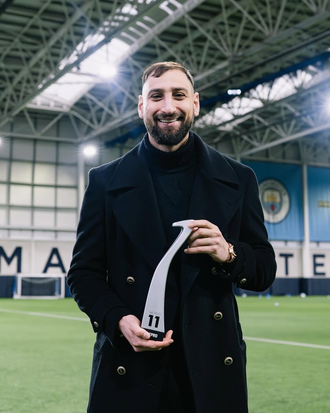 Photo by GIANLUIGI DONNARUMMA in Manchester. May be an image of football, soccer, stadium and text that says 'MA M A TE Ε T 11 WoRD PPRO'.
