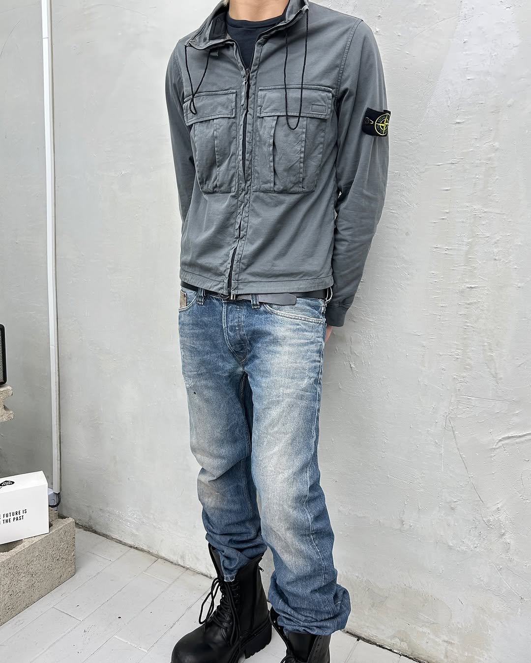 Photo by 도조 홍대 빈티지샵 on April 11, 2026. May be an image of parka, boots, jacket and text.