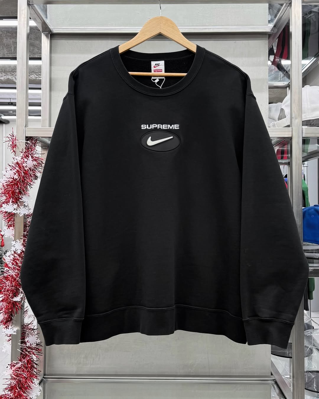 Photo by 도조 홍대 빈티지샵 on January 13, 2026. May be an image of ‎sportswear, fleece, sweatshirt, parka, sweatpants and ‎text that says '‎KyC- سحا SUP SUPREME‎'‎‎.