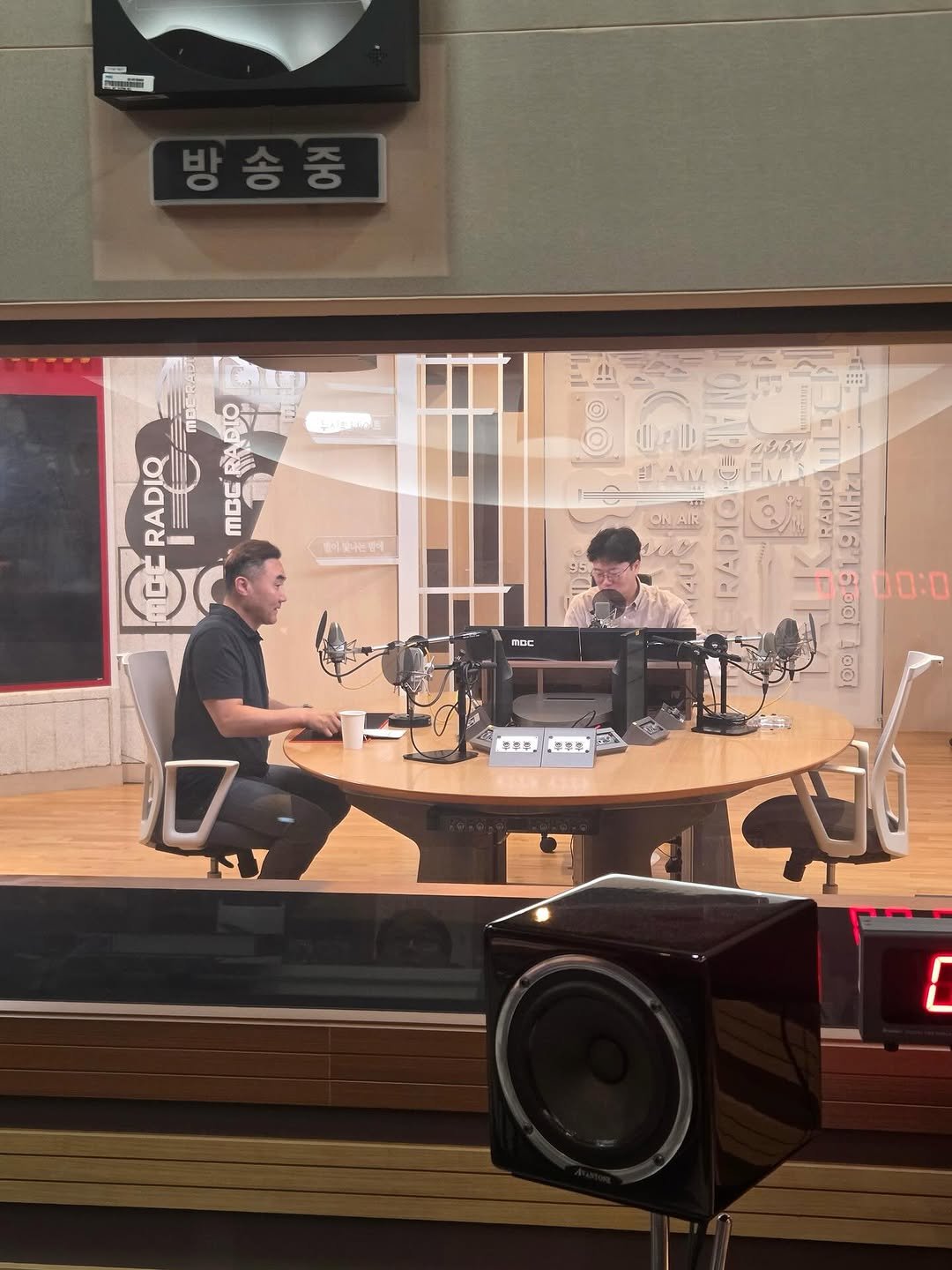 Photo by 홍 정기 on August 12, 2025. May be an image of 2 people, television, speaker, stereo, microphone and text.
