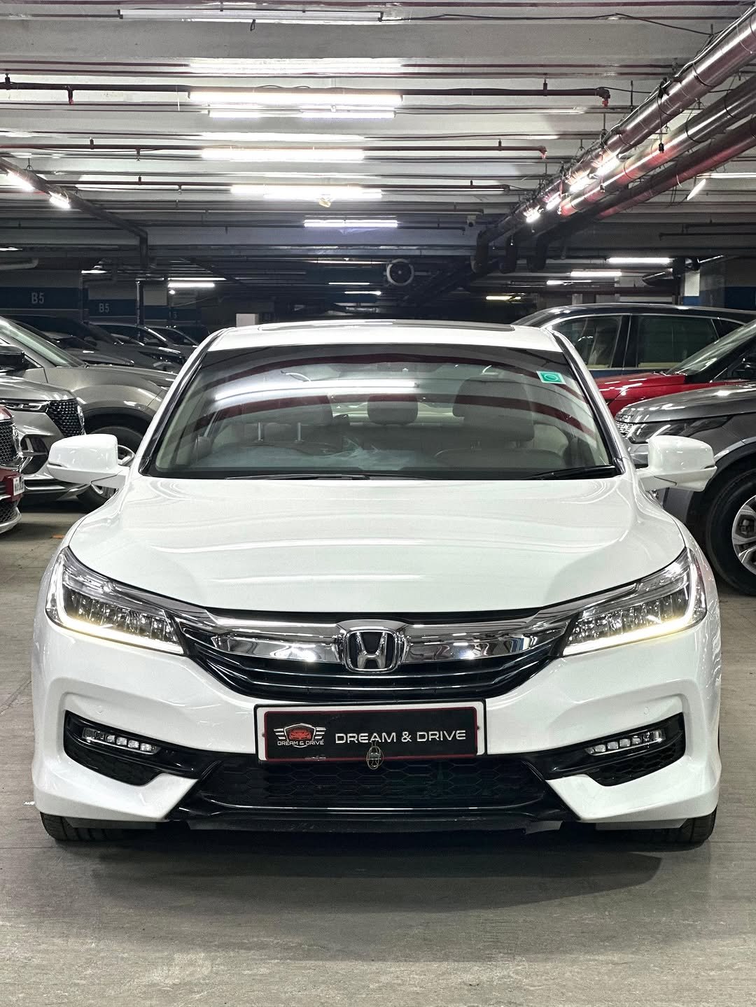 Photo by DREAM & DRIVE on November 15, 2025. May be an image of windshield, sedan, minivan and text.