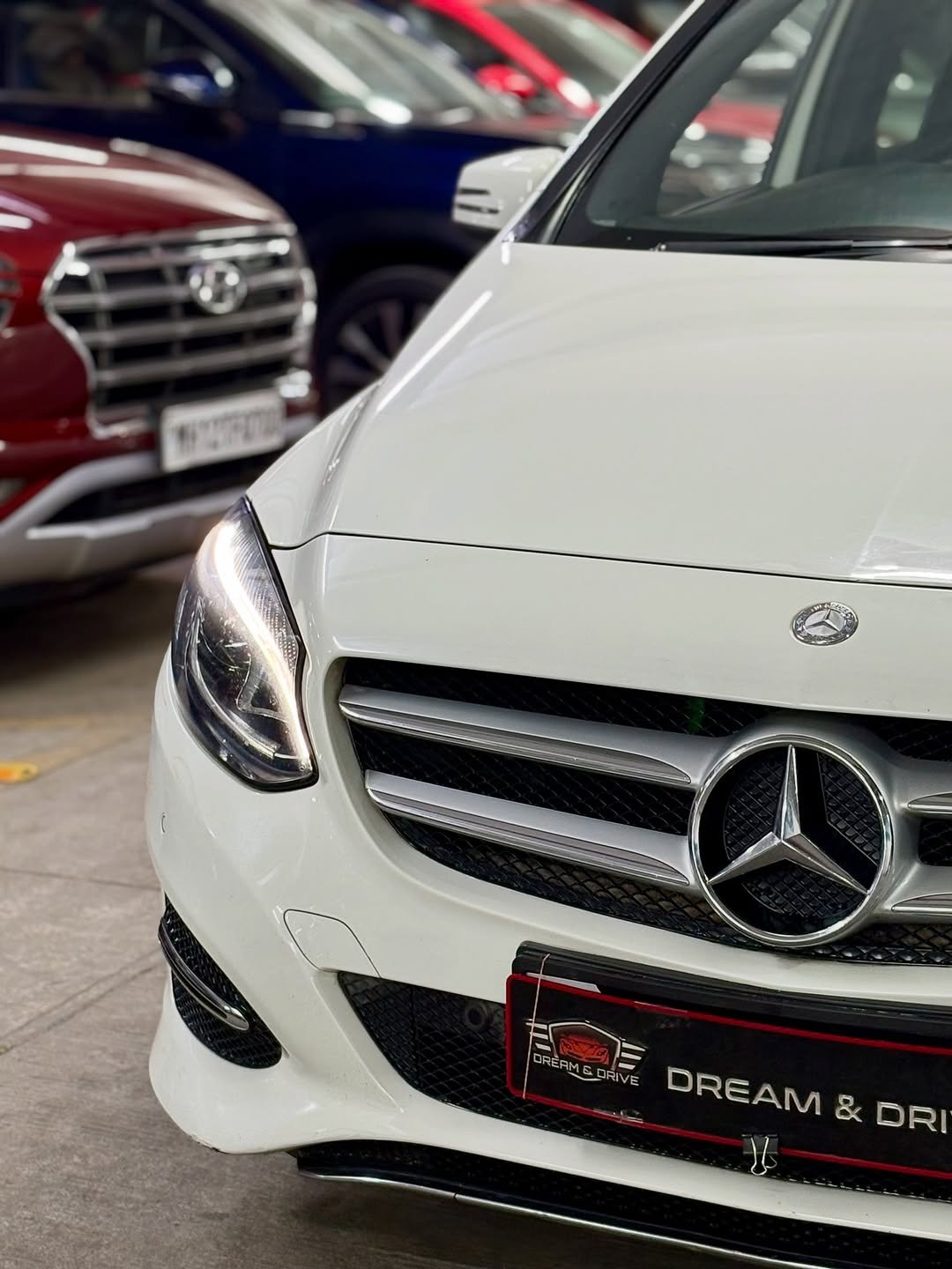 Photo by DREAM & DRIVE on November 15, 2025. May be an image of sedan, windshield, wheel, minivan and text.