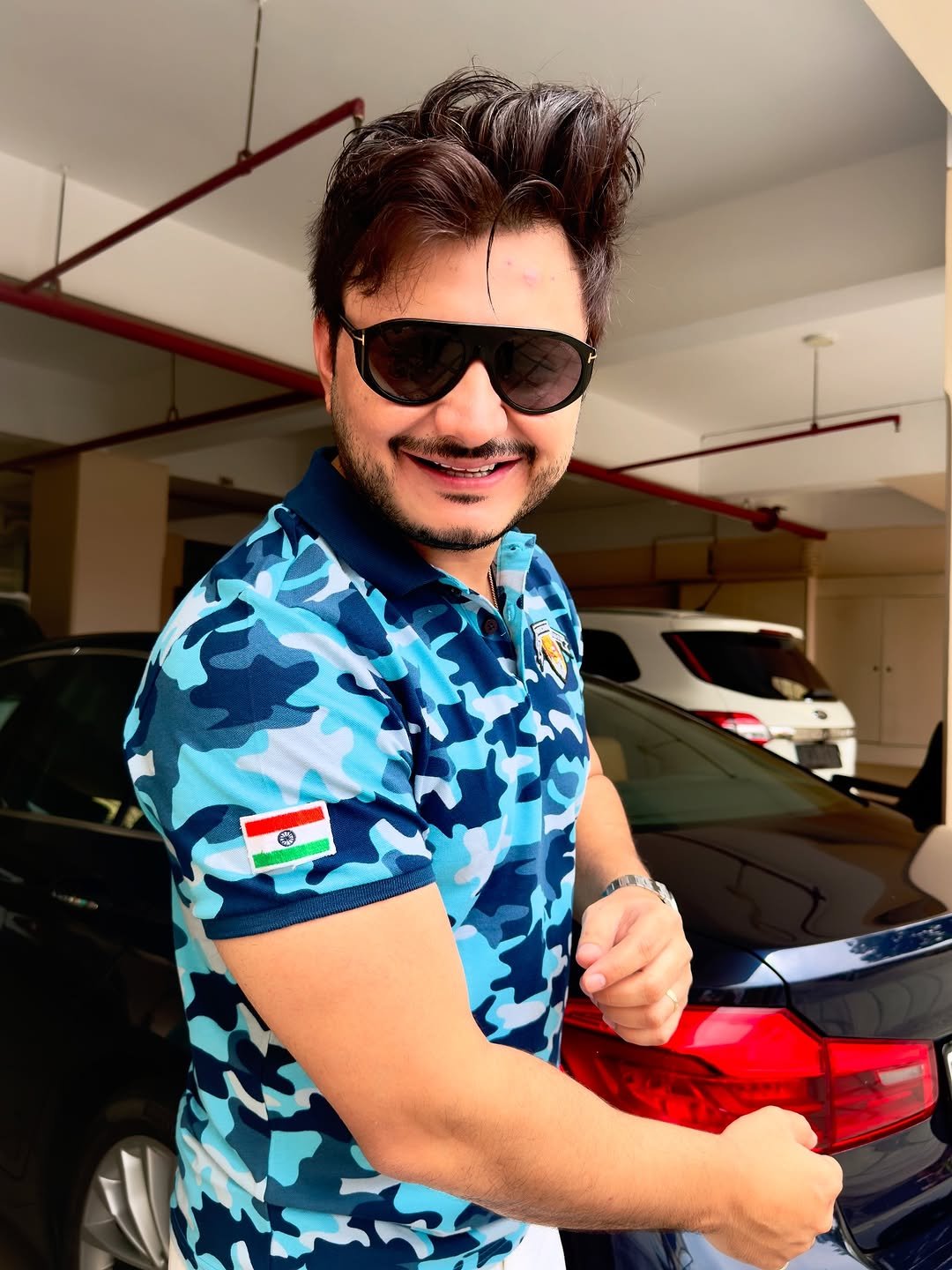 Photo by DR IMRAN S PATEL on August 14, 2025. May be a selfie of 1 person, beard, biceps, smiling, sunglasses and text.