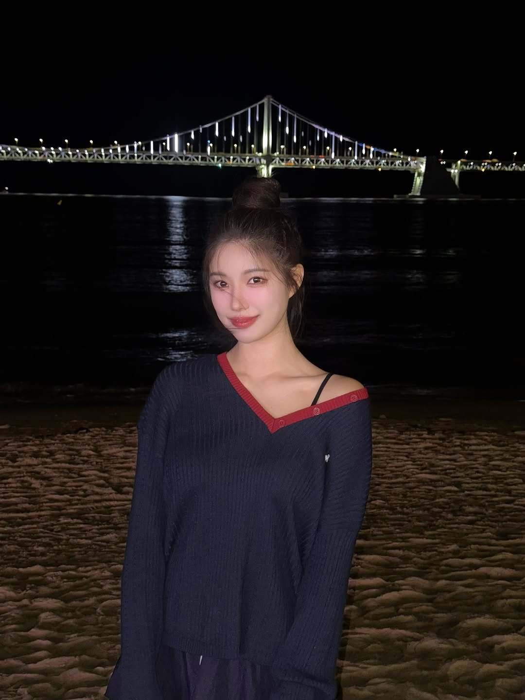 Photo by 윤러브 younluv on September 27, 2025. May be an image of 1 person, beach and text.