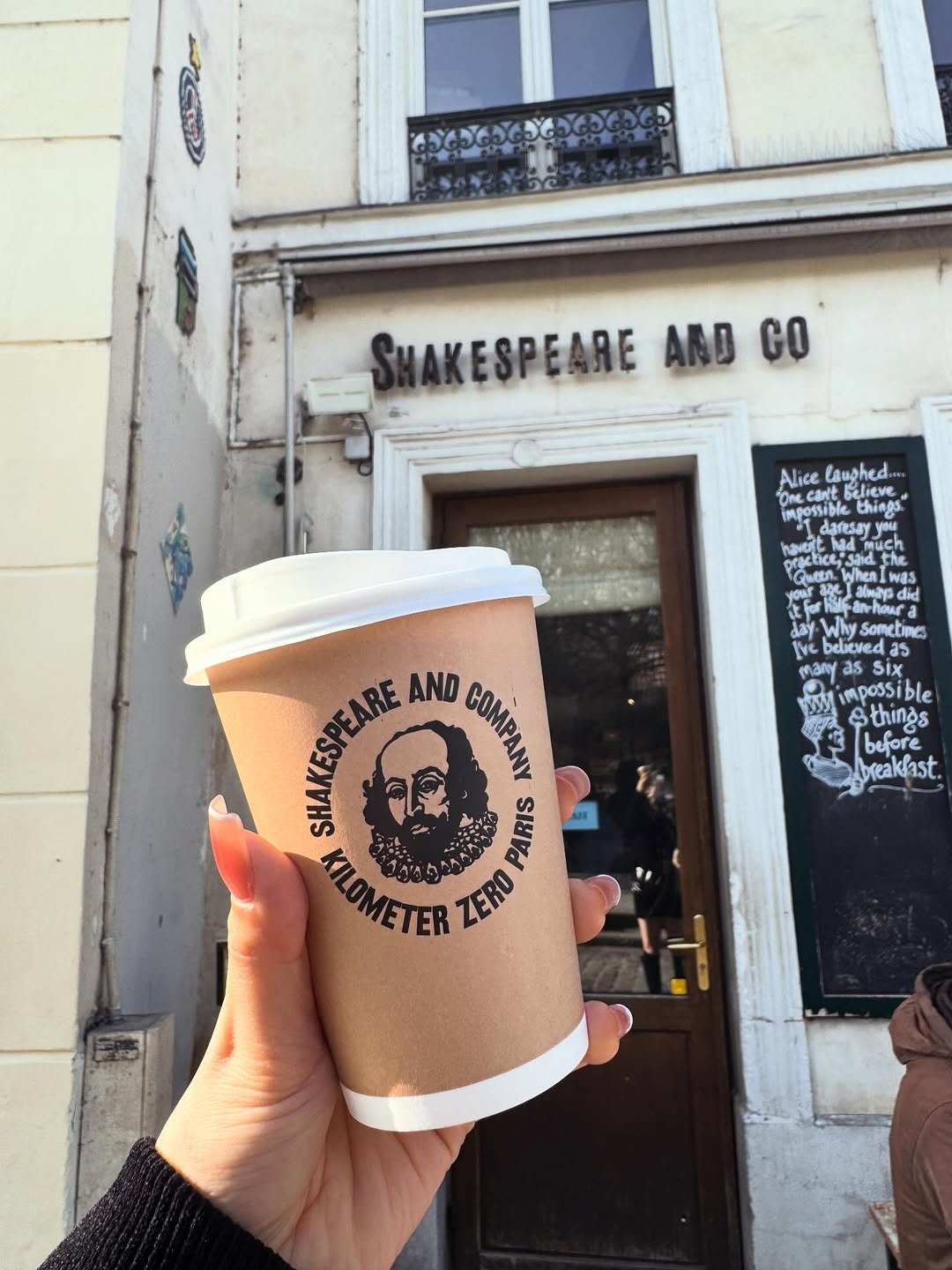 Photo by 김다혜 on March 12, 2026. May be an image of coffee cup and text that says 'SHAKESPEARE AND GO Alice laughed "One believe impossible things daresey uch tyo did Wh Why Somebi ้าน lve beleved as man Six impossible &things before breaklast SHAKESPEARE AND COMPANY COMPANY KILOMETER 이번 PARIS ZERO'.