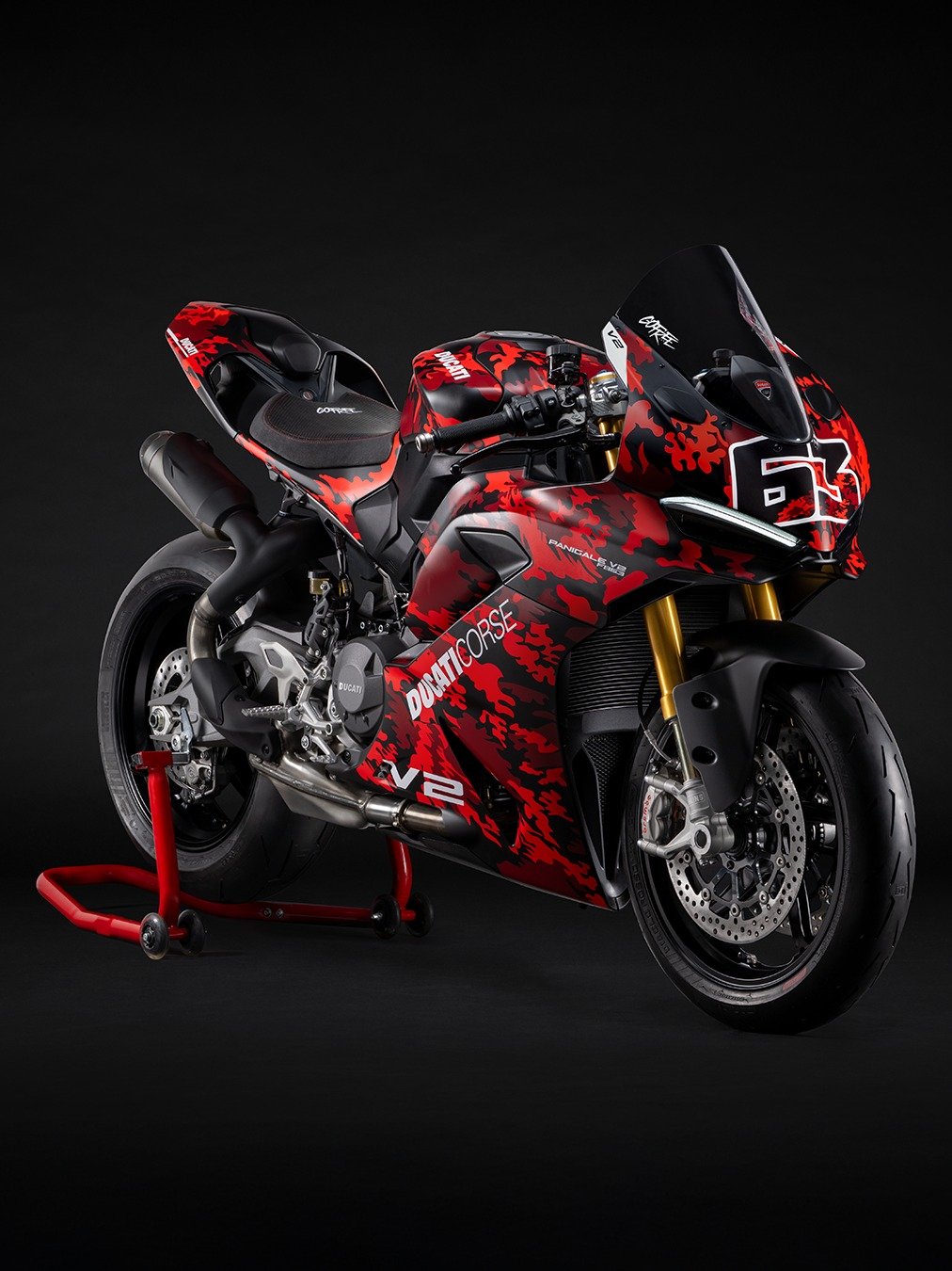 Photo by Ducati Motor Holding on February 11, 2026. May be an image of racing vehicles, motorcycle and text.