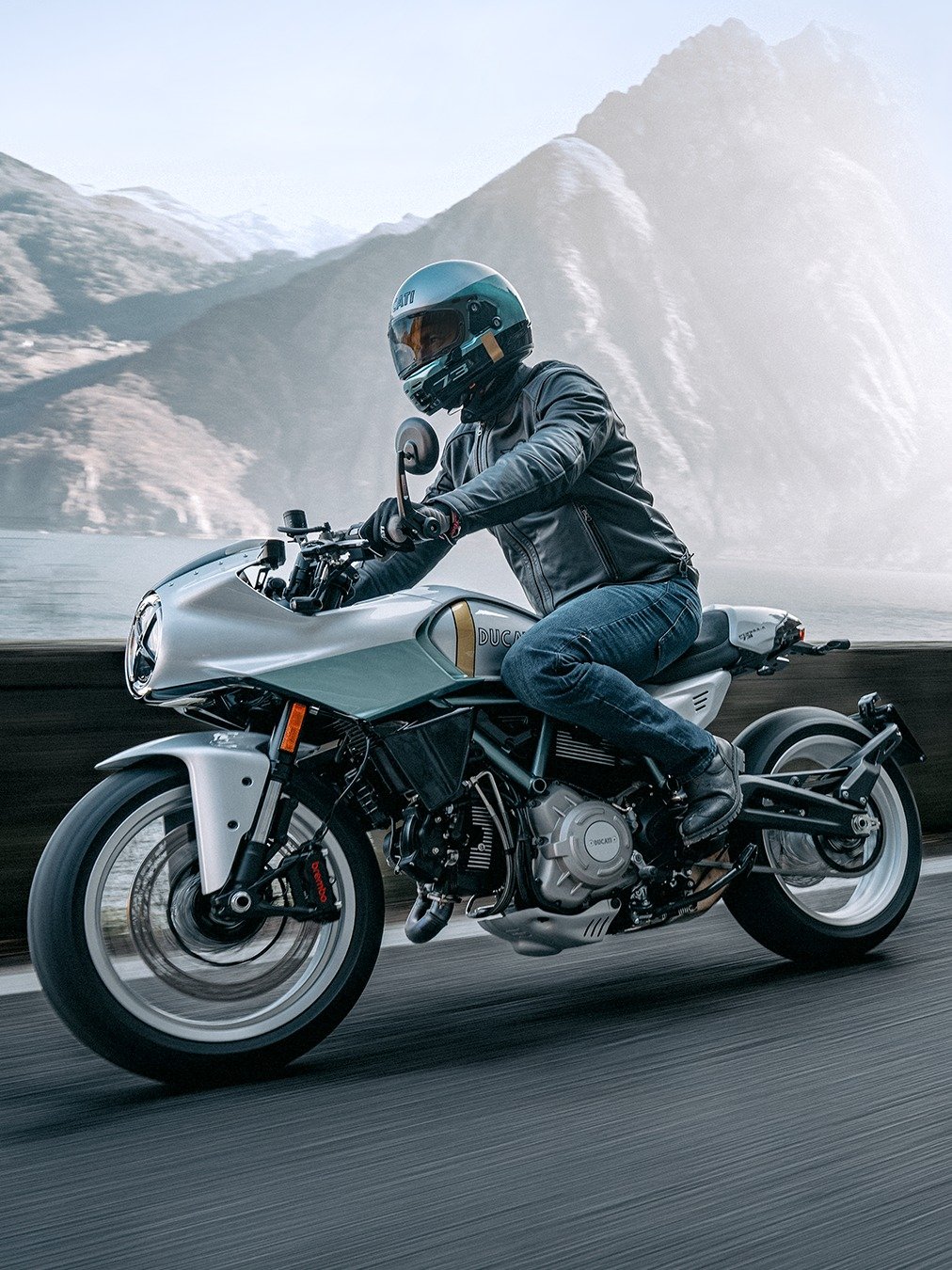 Photo by Ducati Motor Holding on February 13, 2026. May be an image of racing vehicles, motorcycle, helmet and text.