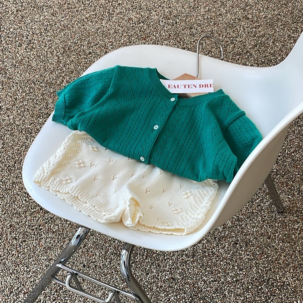 Photo by 오땅뜨 ( e t d ) on July 07, 2025. May be an image of cardigan, knit and text.